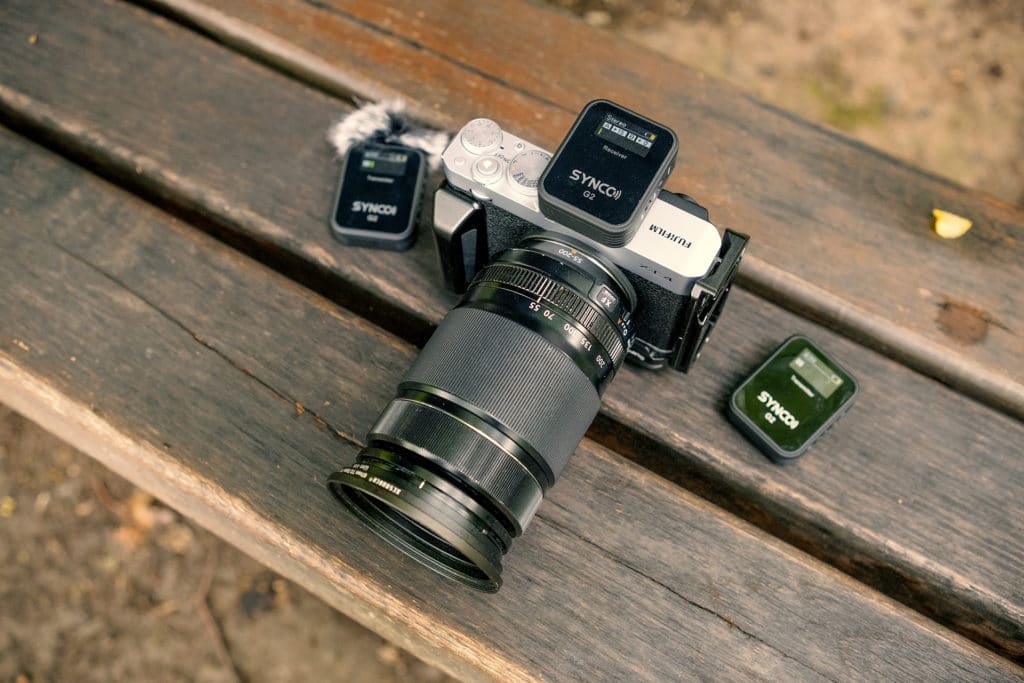 SYNCO G2 A2 transmitter and receiver connected to the Fujifilm X E4 mirrorless camera